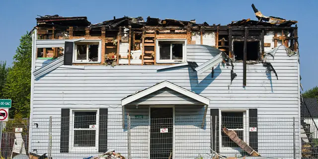Fire-damaged property covered by an SBA disaster assistance title search